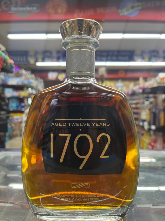 A bottle of 1792 Aged 12 years Bourbon in a store setting. Front Side of the bottle. Kentucky straight bourbon