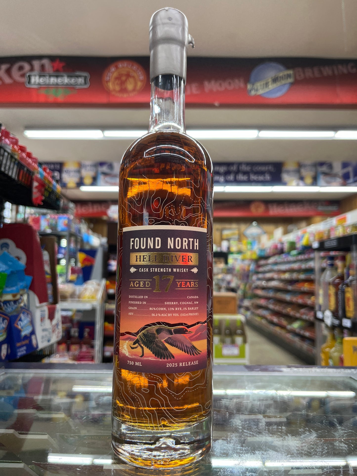 Bottle of Found North whiskey Hell Diver with a label in a store setting