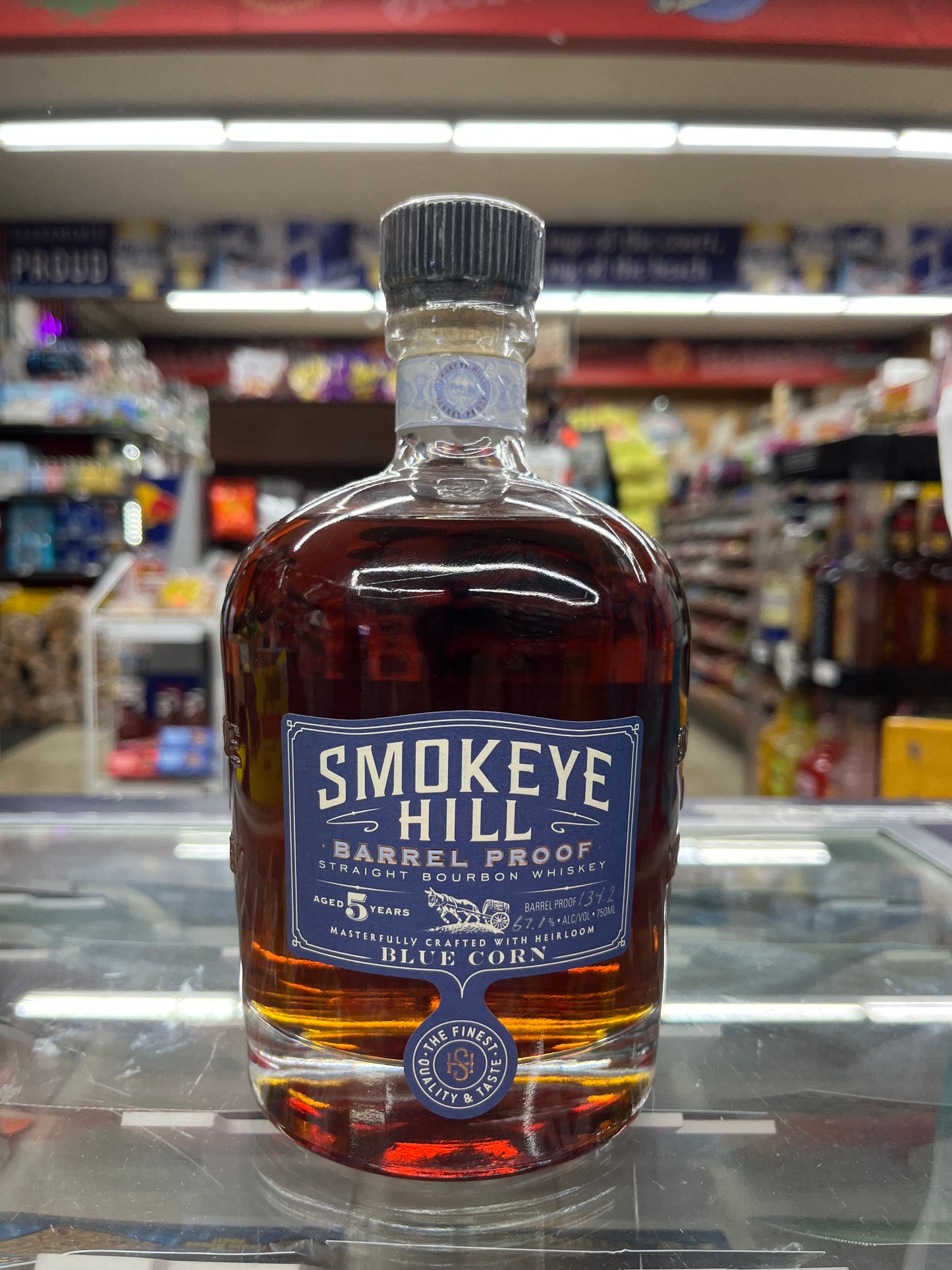 A bottle of Smokeye Hill Barrel Proof Straight Bourbon Whiskey, aged 5 years, on display in a retail setting.