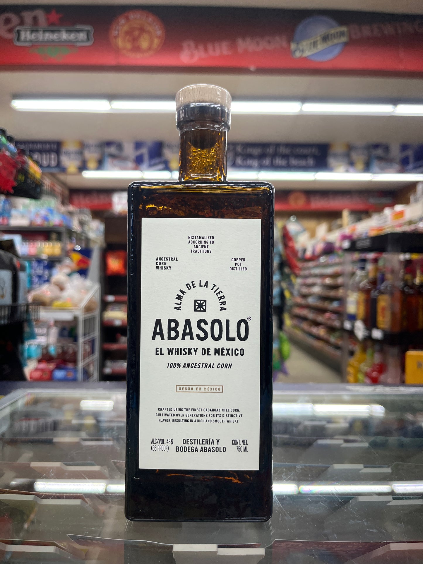 A bottle of Abasolo corn whiskey Bottle of Mexican Whiskey.