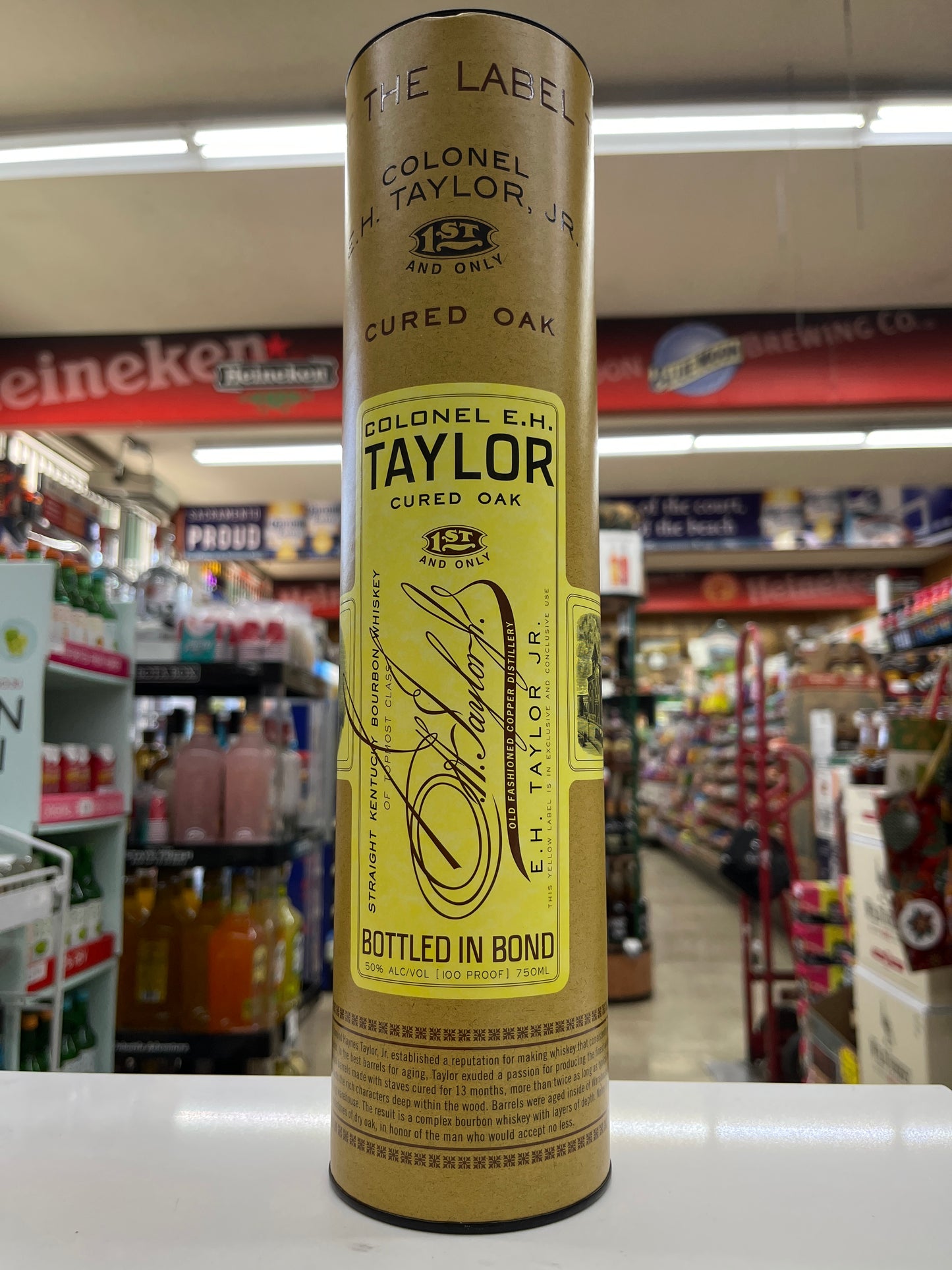 A bottle of new release Colonel E.H. Taylor Cured Oak Kentucky straight bourbon sitting on a shelf at Metro food and liquor in Sacramento, California.