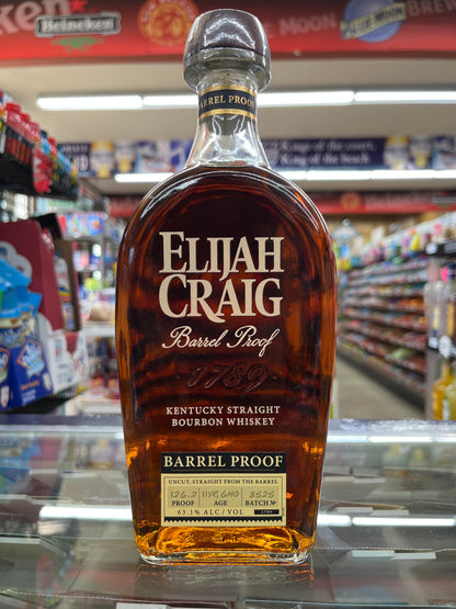 Bottle of Elijah Craig bourbon Batch B525 whiskey in a store setting, Front side. Barrel Proof