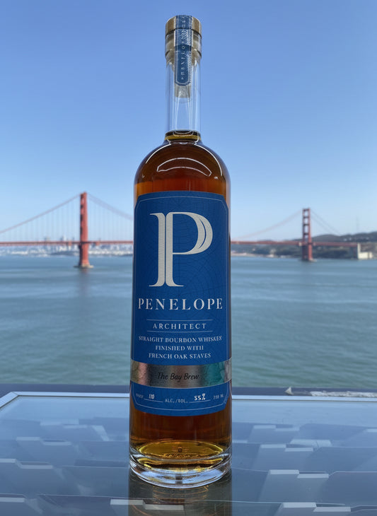 Bottle of Penelope Architect The Bay brew Edition whiskey with a blue label in a store setting
