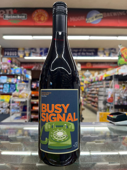 Bottle of Busy Signal Pinot Noir with a label featuring a phone design.