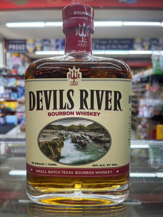 Devil's River Bourbon Whiskey bottle with a scenic label in a store setting
