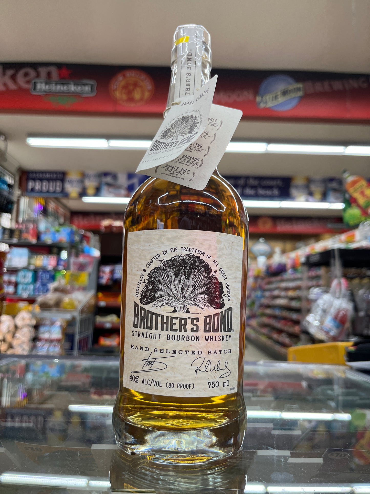Bottle of Brother's Bond Straight Bourbon whiskey with a label in a store setting in Sacramento, California