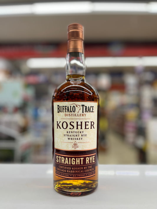 A bottle of Buffalo Trace Distillery Kosher Straight Rye Whiskey standing on a white surface with a blurred store background.