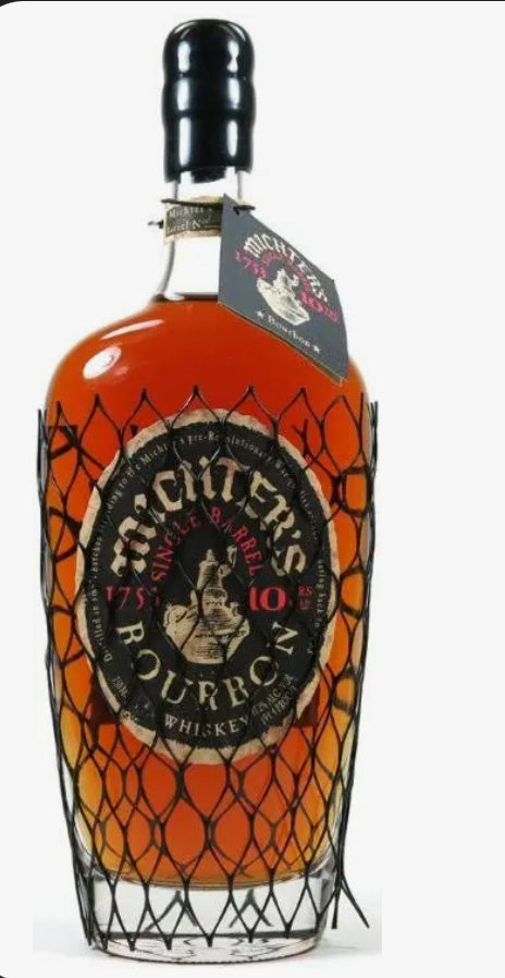 a bottle of Michter's bourbon aged 10 years in a netting around the bottle